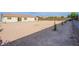 Large backyard area, ready for landscaping and perfect for creating an outdoor oasis at 8665 Jerlyn St, Las Vegas, NV 89113