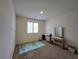 Bright bedroom with carpet and natural light from a window at 8665 Jerlyn St, Las Vegas, NV 89113