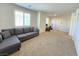 This large bonus room features ample living space and a sun-filled window at 8665 Jerlyn St, Las Vegas, NV 89113