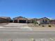 Inviting single-story home with a spacious three-car garage and desert landscaping for easy maintenance at 8665 Jerlyn St, Las Vegas, NV 89113