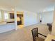 Open living space features updated kitchen with stainless steel appliances and generous countertop space at 8665 Jerlyn St, Las Vegas, NV 89113