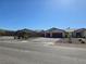 Attractive street view of modern homes with well-maintained landscaping and spacious driveways at 8665 Jerlyn St, Las Vegas, NV 89113
