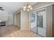 A dining area with tile flooring and a sliding door leading to a patio at 9050 W Warm Springs Rd # 2051, Las Vegas, NV 89148