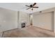 Inviting living room with a fireplace, neutral walls, and a ceiling fan at 9050 W Warm Springs Rd # 2051, Las Vegas, NV 89148