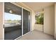 A covered balcony features sliding glass doors that bring the outside in at 913 Duckhorn Ct # 204, Las Vegas, NV 89144