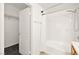 Bright bathroom with tiled shower, tub and walk-in closet at 913 Duckhorn Ct # 204, Las Vegas, NV 89144