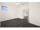 Bedroom features ample light, ceiling fan, and doorway to connecting room at 913 Duckhorn Ct # 204, Las Vegas, NV 89144