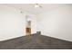 Comfortable bedroom featuring gray carpeting and natural light at 913 Duckhorn Ct # 204, Las Vegas, NV 89144