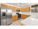 Well-equipped kitchen featuring stainless steel appliances, light cabinets, and tile flooring for easy maintenance at 913 Duckhorn Ct # 204, Las Vegas, NV 89144