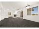 Bright living room featuring a fireplace, large windows, and open layout perfect for entertaining at 913 Duckhorn Ct # 204, Las Vegas, NV 89144