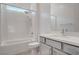 Bathroom featuring subway tile surround, showerhead, and vanity with a mirror at 924 Allister Fields Ln, Las Vegas, NV 89138