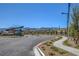 Community entrance with stone sign, landscaping, and mountain backdrop at 924 Allister Fields Ln, Las Vegas, NV 89138