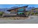 Community entrance featuring modern architecture and manicured landscaping at 924 Allister Fields Ln, Las Vegas, NV 89138