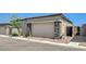 Two-car garage with closed door and beautiful stone accents at 924 Allister Fields Ln, Las Vegas, NV 89138