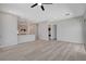 Open-concept living room showcasing modern design and light wood floors at 924 Allister Fields Ln, Las Vegas, NV 89138