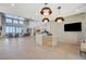 Open lobby area with high ceilings, modern furnishings, and natural light at 924 Allister Fields Ln, Las Vegas, NV 89138