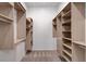 Spacious walk-in closet with built-in shelving and plenty of storage space at 924 Allister Fields Ln, Las Vegas, NV 89138