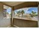 Enjoy picturesque palm tree and street views from the private outdoor balcony at 9303 Gilcrease Ave # 2198, Las Vegas, NV 89149