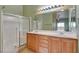 Bright bathroom featuring a double sink vanity and a shower-tub combo at 9303 Gilcrease Ave # 2198, Las Vegas, NV 89149