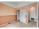 Bedroom featuring neutral carpet, a closet, and doorway, offering comfortable living space at 9303 Gilcrease Ave # 2198, Las Vegas, NV 89149