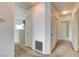 Carpeted hallway with access to living spaces and storage at 9303 Gilcrease Ave # 2198, Las Vegas, NV 89149