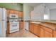 Kitchen featuring tile flooring and light colored cabinets at 9303 Gilcrease Ave # 2198, Las Vegas, NV 89149