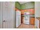 Kitchen with appliances and tile flooring at 9303 Gilcrease Ave # 2198, Las Vegas, NV 89149