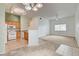 Open-concept living room and kitchen with modern appliances and plenty of space at 9303 Gilcrease Ave # 2198, Las Vegas, NV 89149