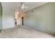 Light-filled bedroom featuring plush carpet and access to a private ensuite bathroom at 9303 Gilcrease Ave # 2198, Las Vegas, NV 89149