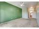 Comfortable bedroom with plush carpet and entry to the ensuite bathroom with double sinks at 9303 Gilcrease Ave # 2198, Las Vegas, NV 89149