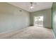 Inviting main bedroom featuring neutral paint, ceiling fan, and private balcony access at 9303 Gilcrease Ave # 2198, Las Vegas, NV 89149