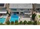 Aerial view of backyard, pool, spa, court, and outdoor living area at 9710 Hiking Ave, Las Vegas, NV 89166