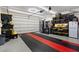 Well-organized garage with epoxy flooring and ample storage at 9710 Hiking Ave, Las Vegas, NV 89166