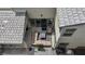 Aerial view of a cozy patio with an outdoor seating area and a fire pit table at 9710 Hiking Ave, Las Vegas, NV 89166
