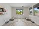 Bright and airy room with secure pet enclosures, perfect as a dog room or adaptable for other uses at 9710 Hiking Ave, Las Vegas, NV 89166