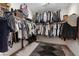 Walk-in closet featuring organized racks and shelves offering ample clothing storage solutions at 9710 Hiking Ave, Las Vegas, NV 89166