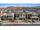 Beautiful aerial view of the home and the neighborhood with mountain views at 10057 Matter Overlook Dr, Las Vegas, NV 89178