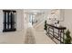 Spacious foyer with neutral walls and staircase view, creating a welcoming entrance at 10057 Matter Overlook Dr, Las Vegas, NV 89178