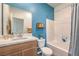 Clean bathroom with a vanity, toilet, and bathtub, featuring modern fixtures at 1013 Gentle Swan St # 696, Henderson, NV 89011