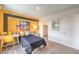 Bedroom features a desk, carpeted floors, closet and colorful decor at 1013 Gentle Swan St # 696, Henderson, NV 89011