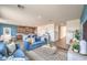 Spacious living room seamlessly connects to the modern kitchen with stainless appliances at 1013 Gentle Swan St # 696, Henderson, NV 89011
