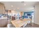 Open concept kitchen and dining area provides a perfect space for entertaining guests at 1013 Gentle Swan St # 696, Henderson, NV 89011