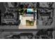 Bird's eye view featuring the backyard pool area and covered parking of this desert home at 10140 W Tropical Pkwy, Las Vegas, NV 89149