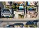 Aerial shot of desert house highlighting backyard pool, lawn, and carport at 10140 W Tropical Pkwy, Las Vegas, NV 89149