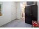 Versatile basement space with storage and neutral carpet at 10140 W Tropical Pkwy, Las Vegas, NV 89149