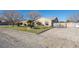 Charming desert home featuring a well-maintained yard and ample parking space at 10140 W Tropical Pkwy, Las Vegas, NV 89149