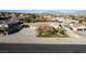 Well maintained property features a desert landscaped front yard and an extended driveway with a carport at 10140 W Tropical Pkwy, Las Vegas, NV 89149