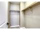 Walk-in closet with shelving for storage, carpeted floors and neutral paint at 10164 Phelps Lake Ct, Las Vegas, NV 89148