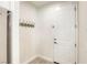 Functional mud room with door to the outside and convenient coat hooks at 10164 Phelps Lake Ct, Las Vegas, NV 89148