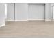 Bright open floor plan living room with light wood floors and gray walls creates a modern space at 11707 Hatchling Ave, Las Vegas, NV 89138